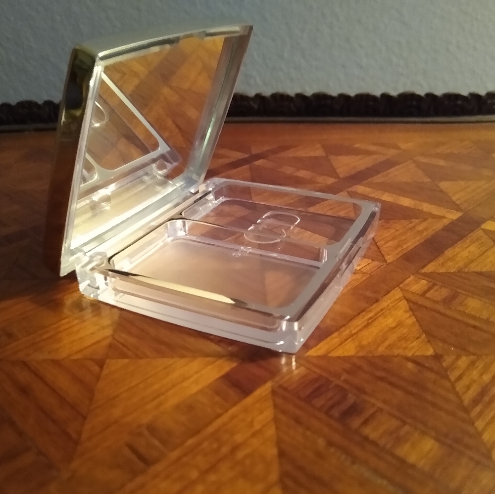 NEW. Christian Dior Silver mirrored compact case.